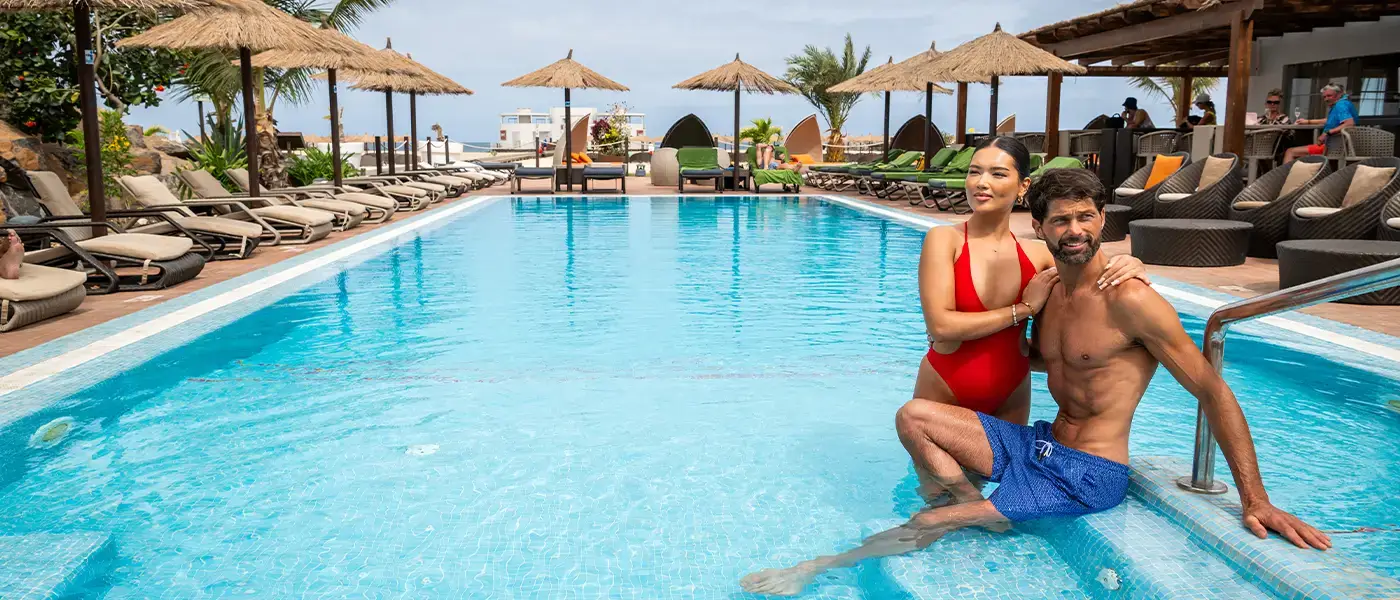 A couple in a swimming pool